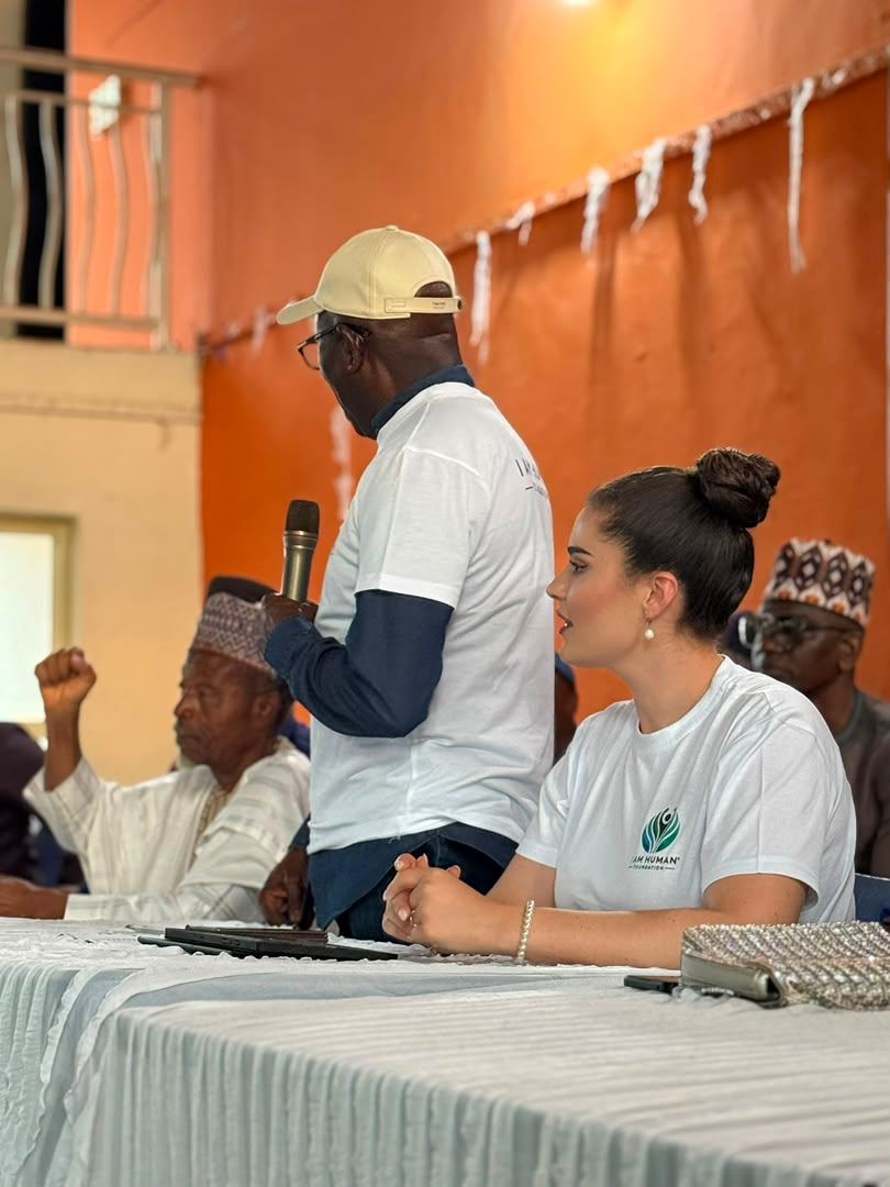 Shalimar Abbiusi seated at the panel table of a training and empowerment event