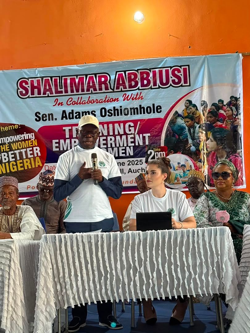 Women seated together at the training and empowerment event
